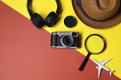 Flat lay composition with travel blogger`s items on color background