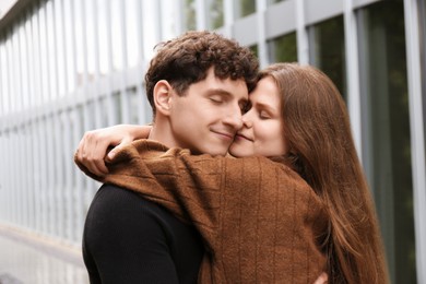 International dating. Lovely young couple spending time together outdoors