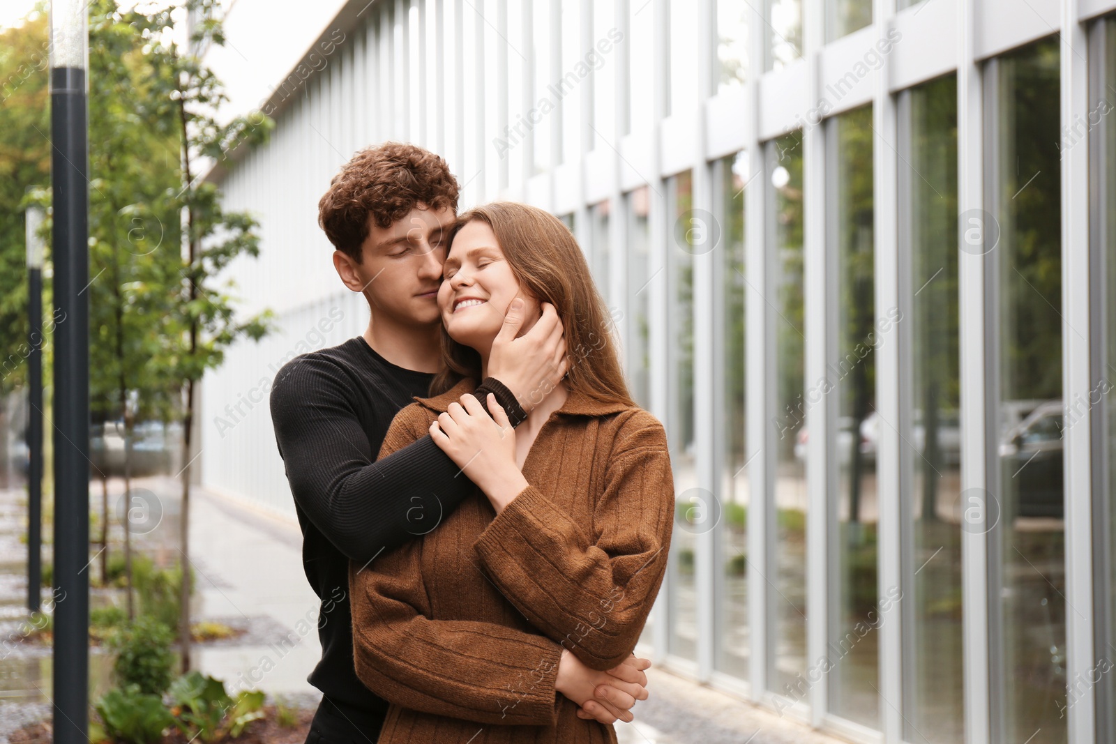 Photo of International dating. Lovely young couple spending time together outdoors, space for text