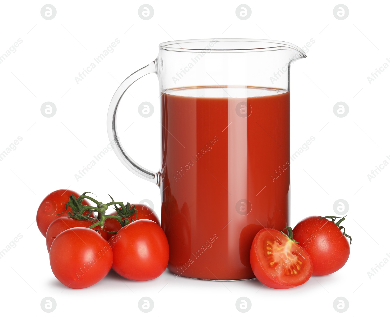 Photo of Tasty tomato juice in glass jug and fresh vegetables isolated on white