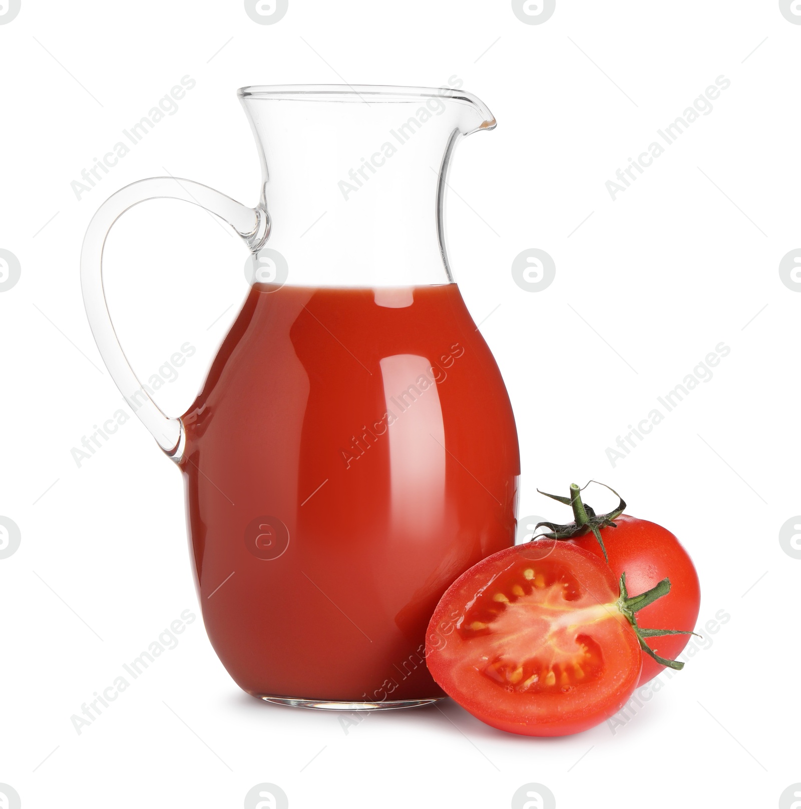 Photo of Tasty tomato juice in glass jug and fresh vegetables isolated on white