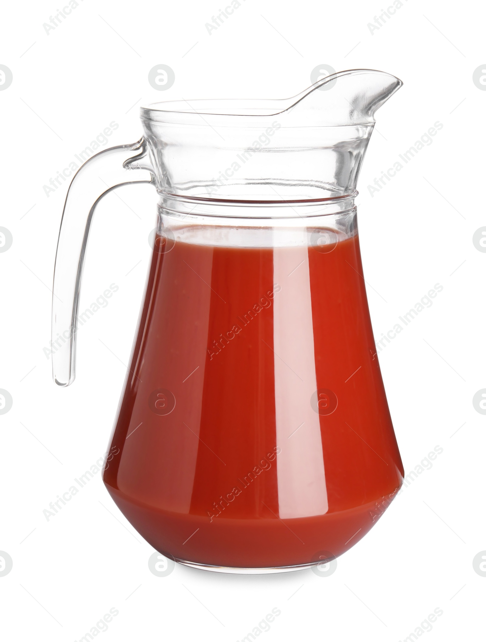 Photo of Fresh tomato juice in glass jug isolated on white