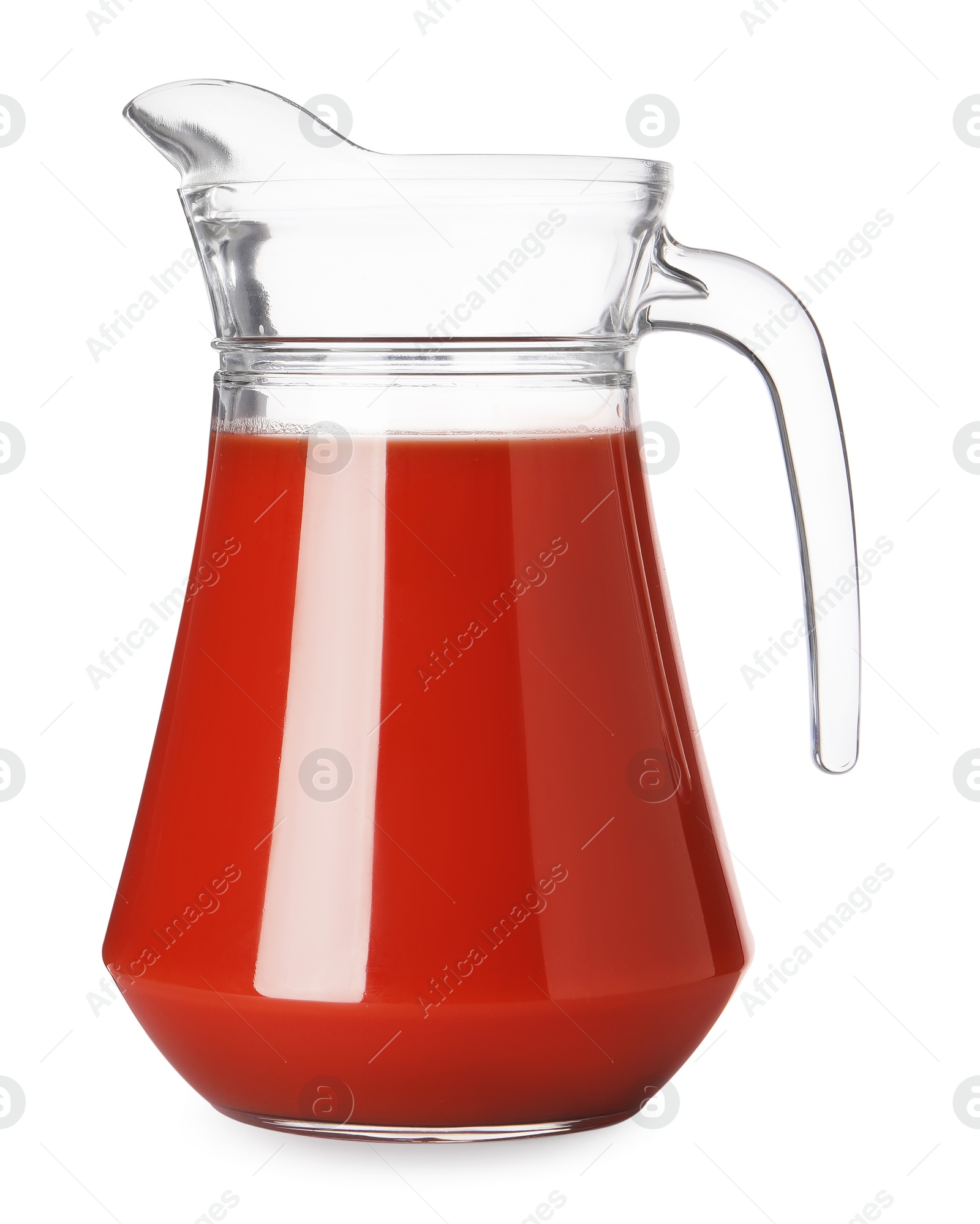 Photo of Fresh tomato juice in glass jug isolated on white