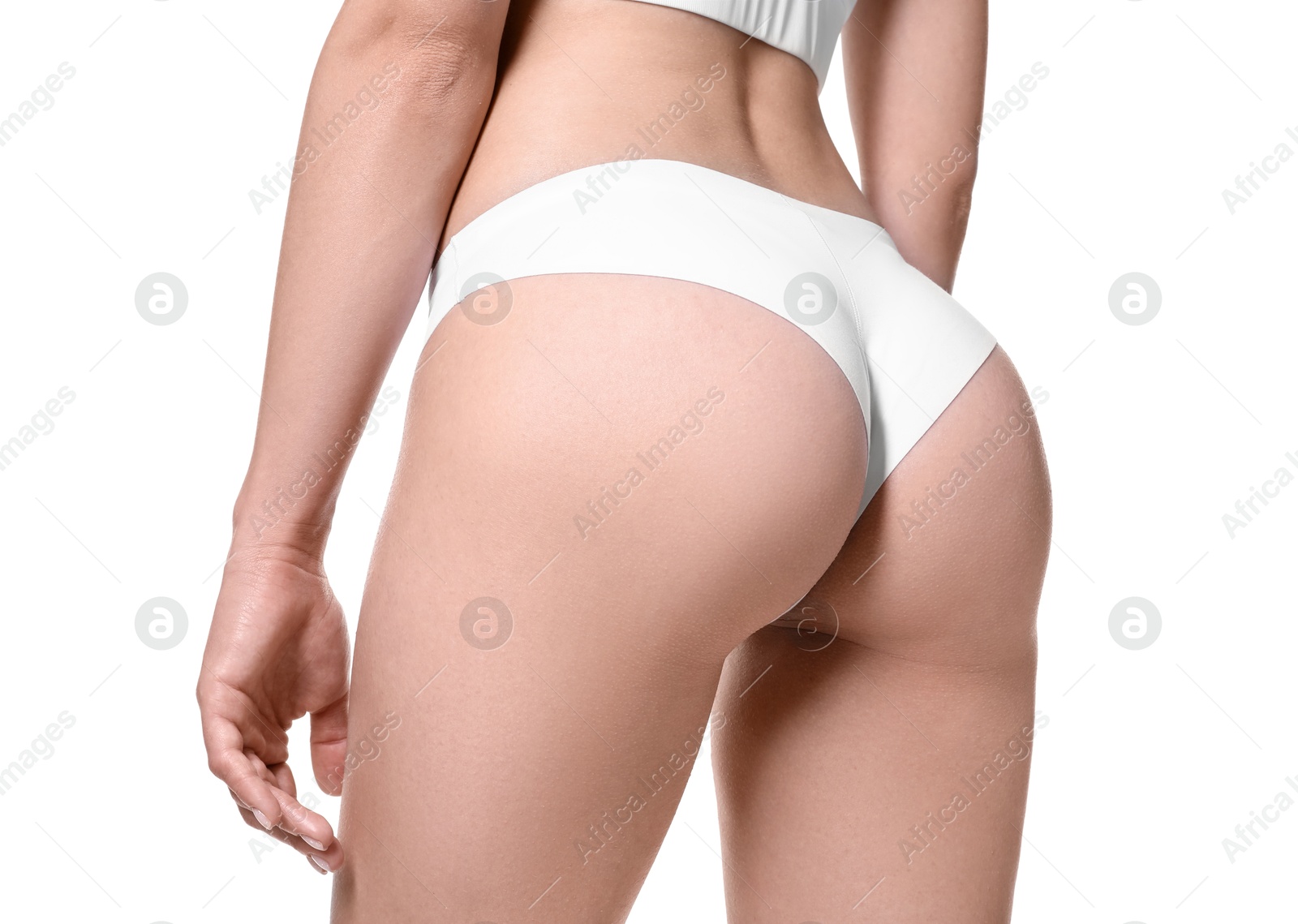 Photo of Woman in underwear on white background, closeup. Cellulite problem