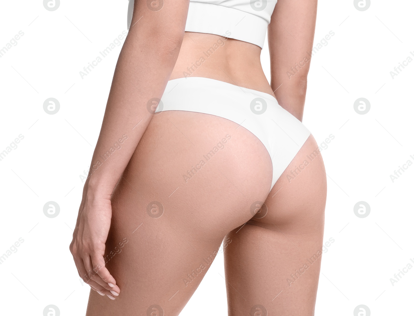Photo of Woman in underwear on white background, closeup. Cellulite problem