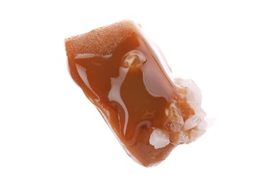 Photo of Yummy candy with salted caramel isolated on white