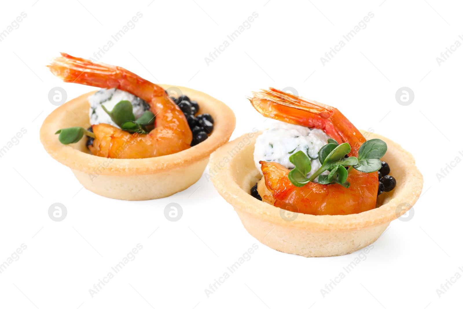 Photo of Delicious canapes with shrimps and black caviar isolated on white