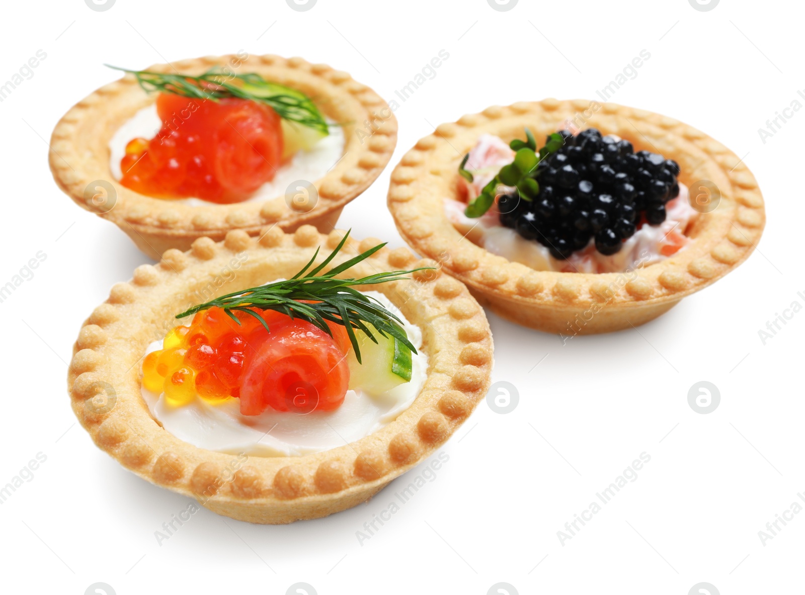 Photo of Delicious canapes with salmon and caviar isolated on white