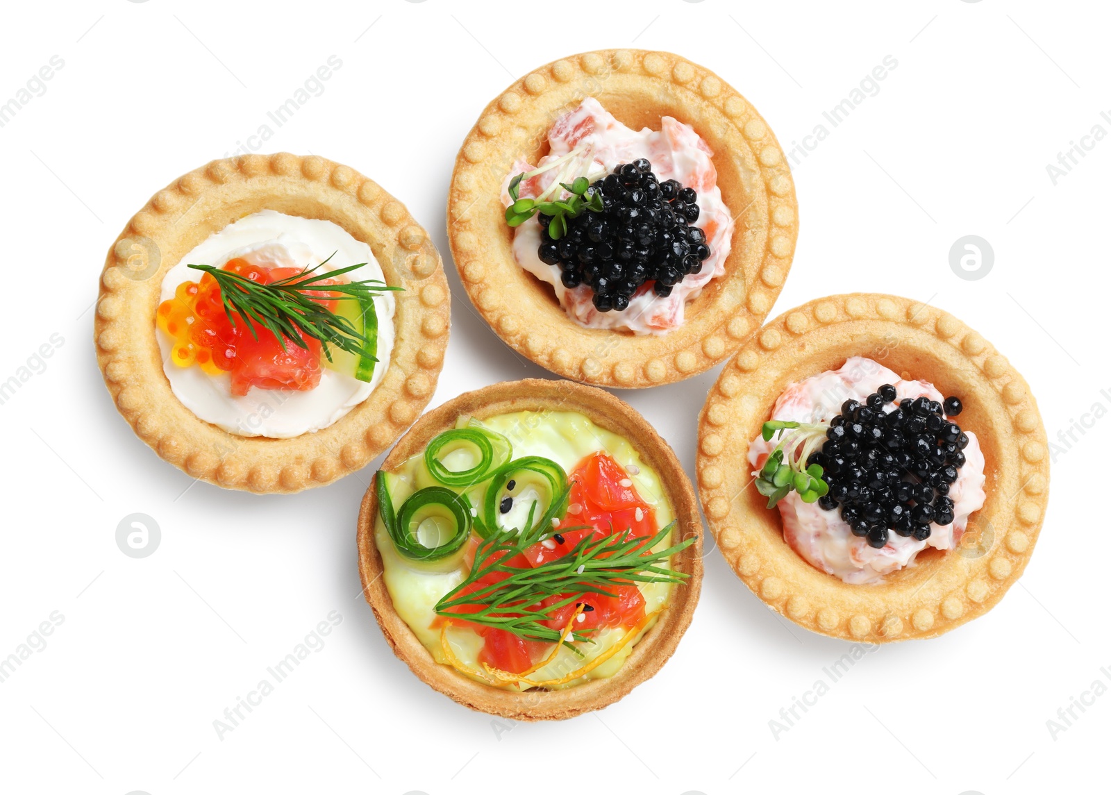 Photo of Delicious canapes with salmon and caviar isolated on white, top view