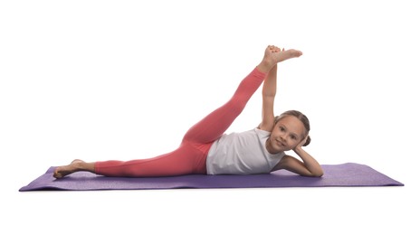 Photo of Cute little girl stretching on white background