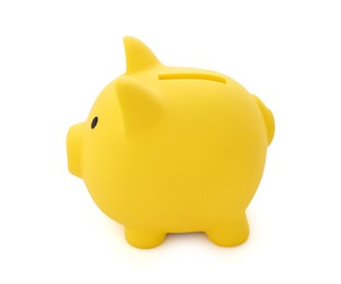 Photo of One yellow piggy bank isolated on white