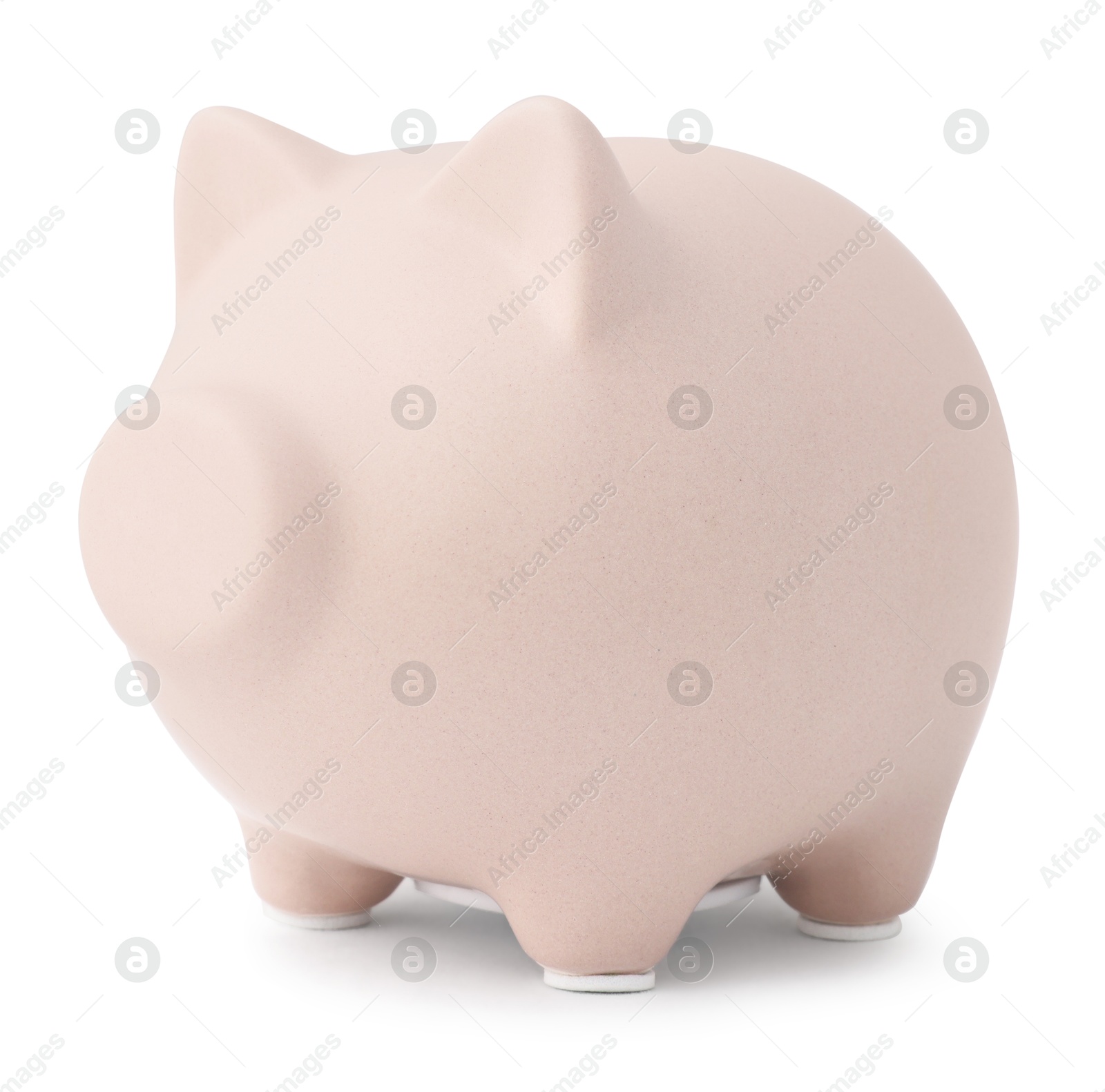 Photo of One beige piggy bank isolated on white