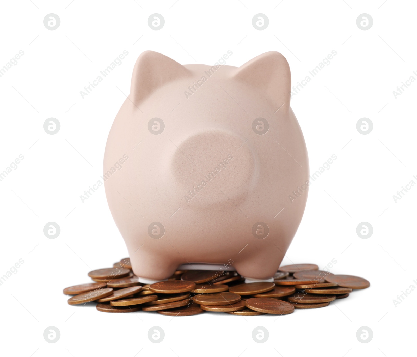 Photo of Beige piggy bank and coins isolated on white