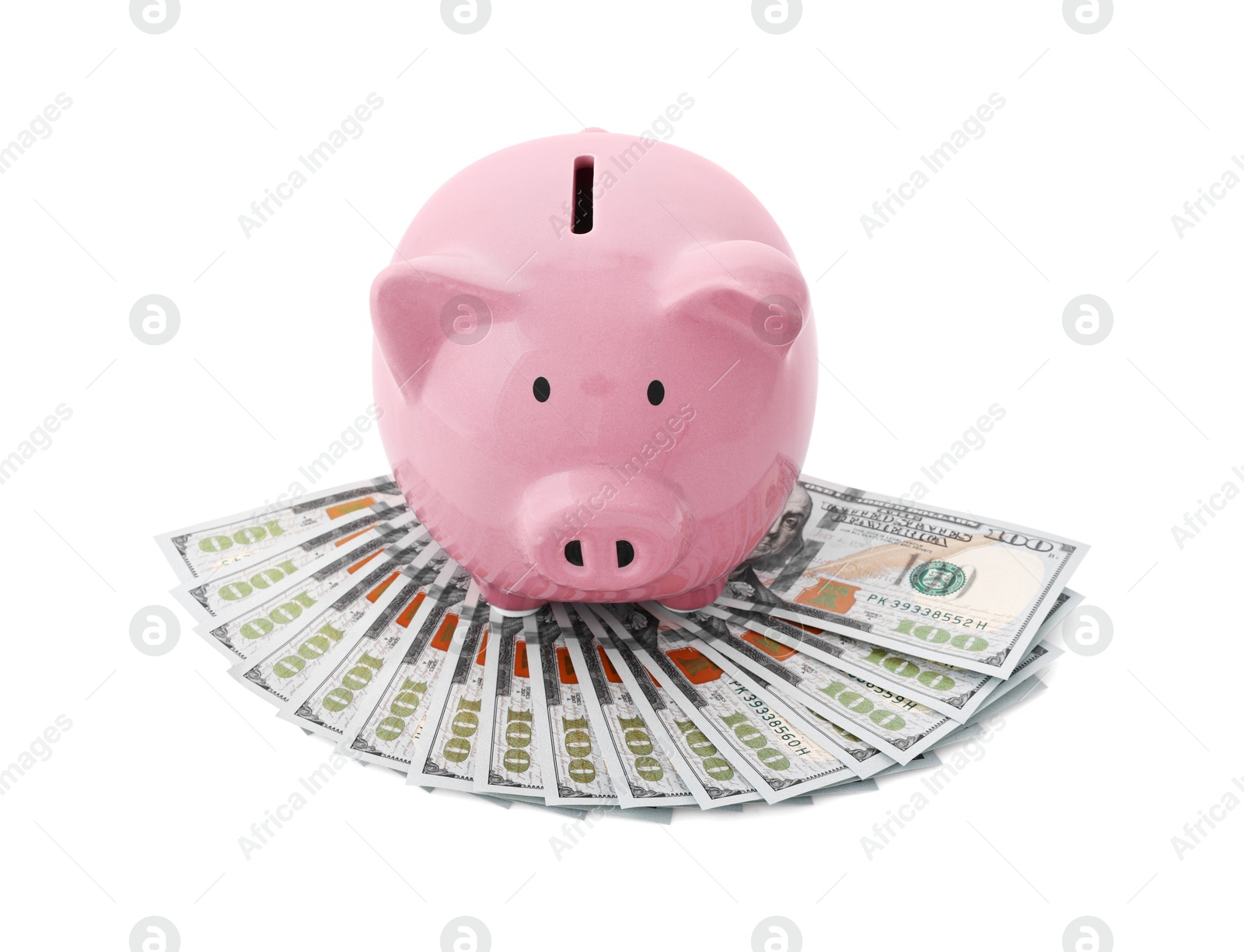 Photo of Pink piggy bank and money on white background