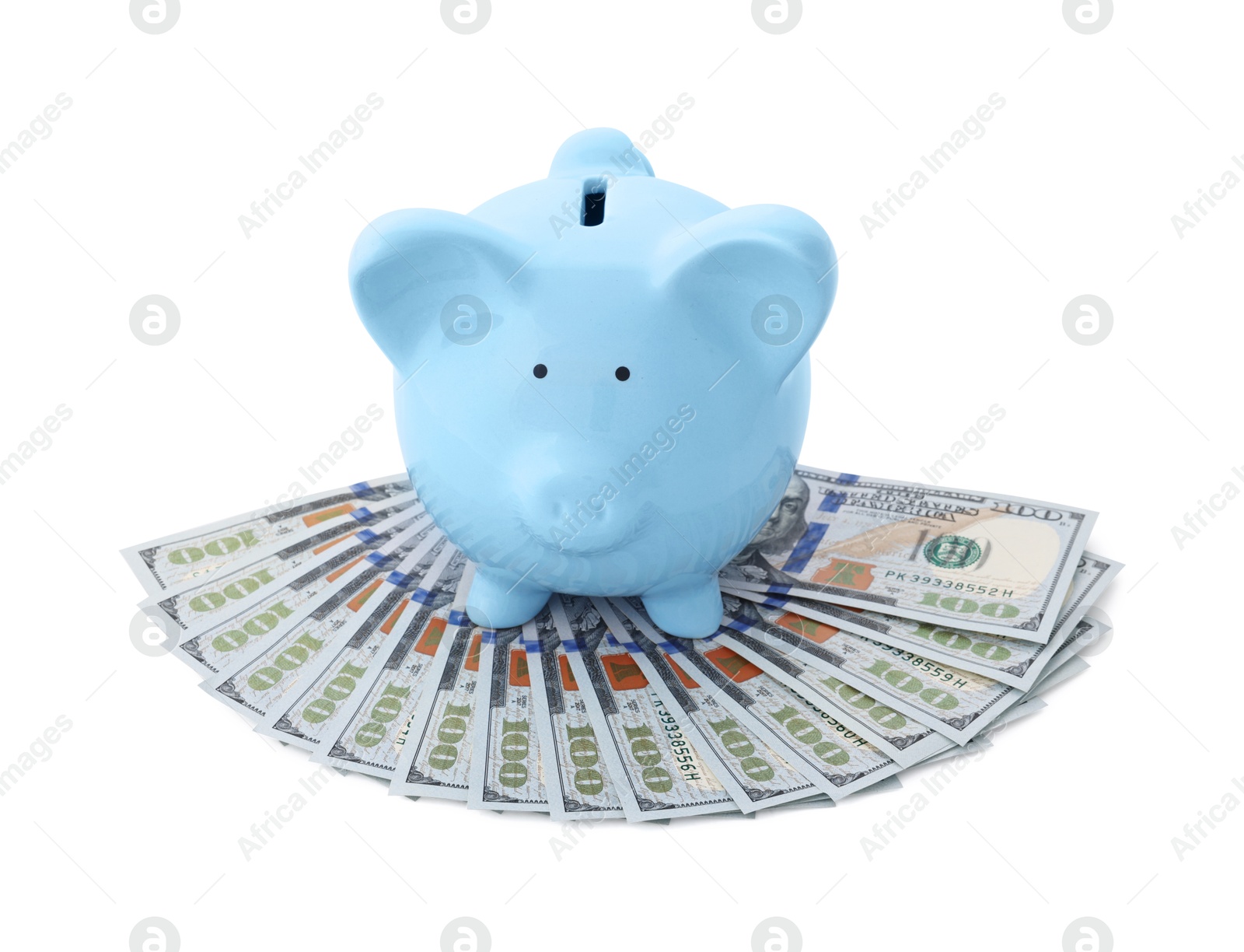 Photo of Light blue piggy bank and money on white background