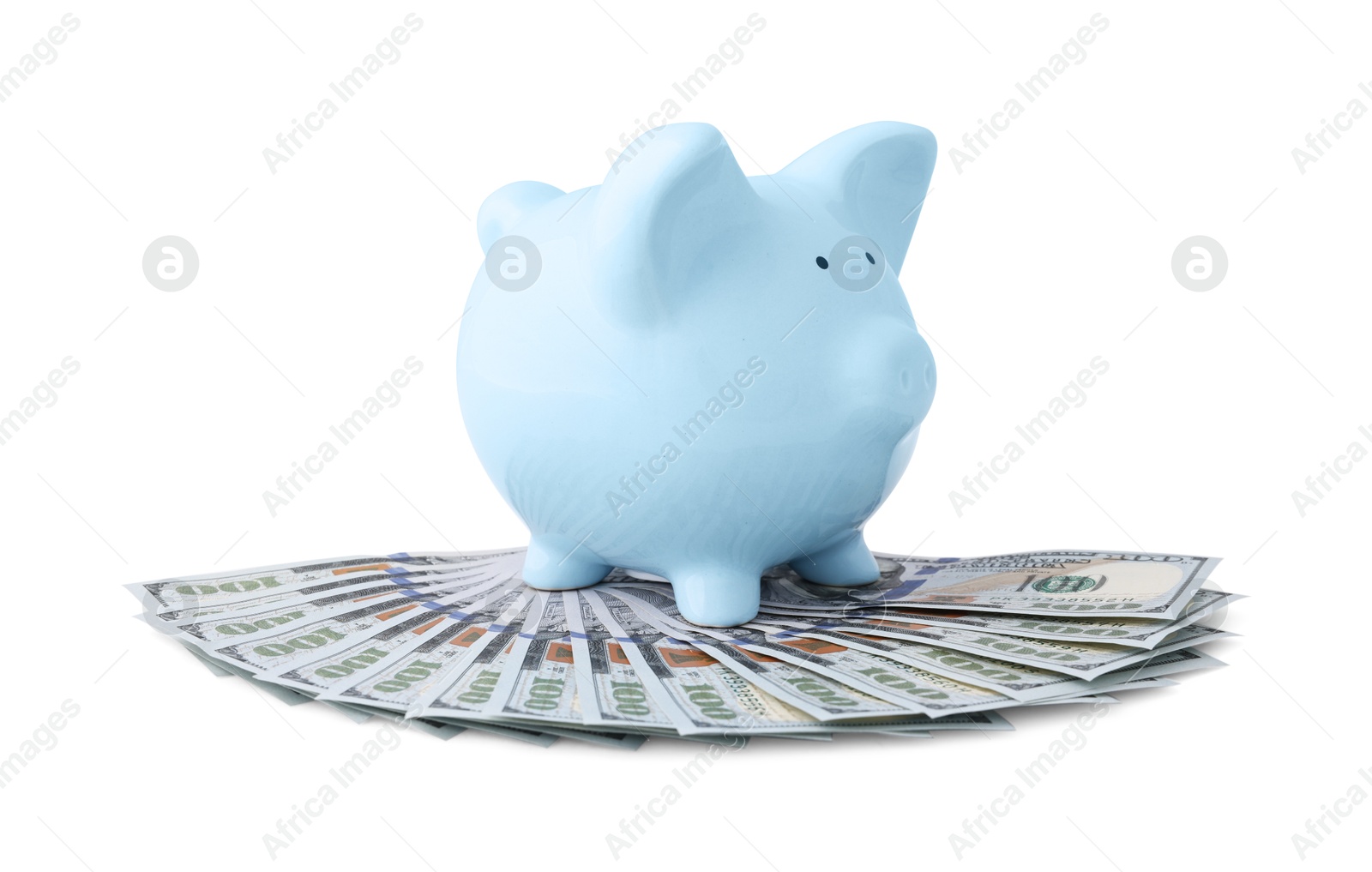 Photo of Light blue piggy bank and money on white background