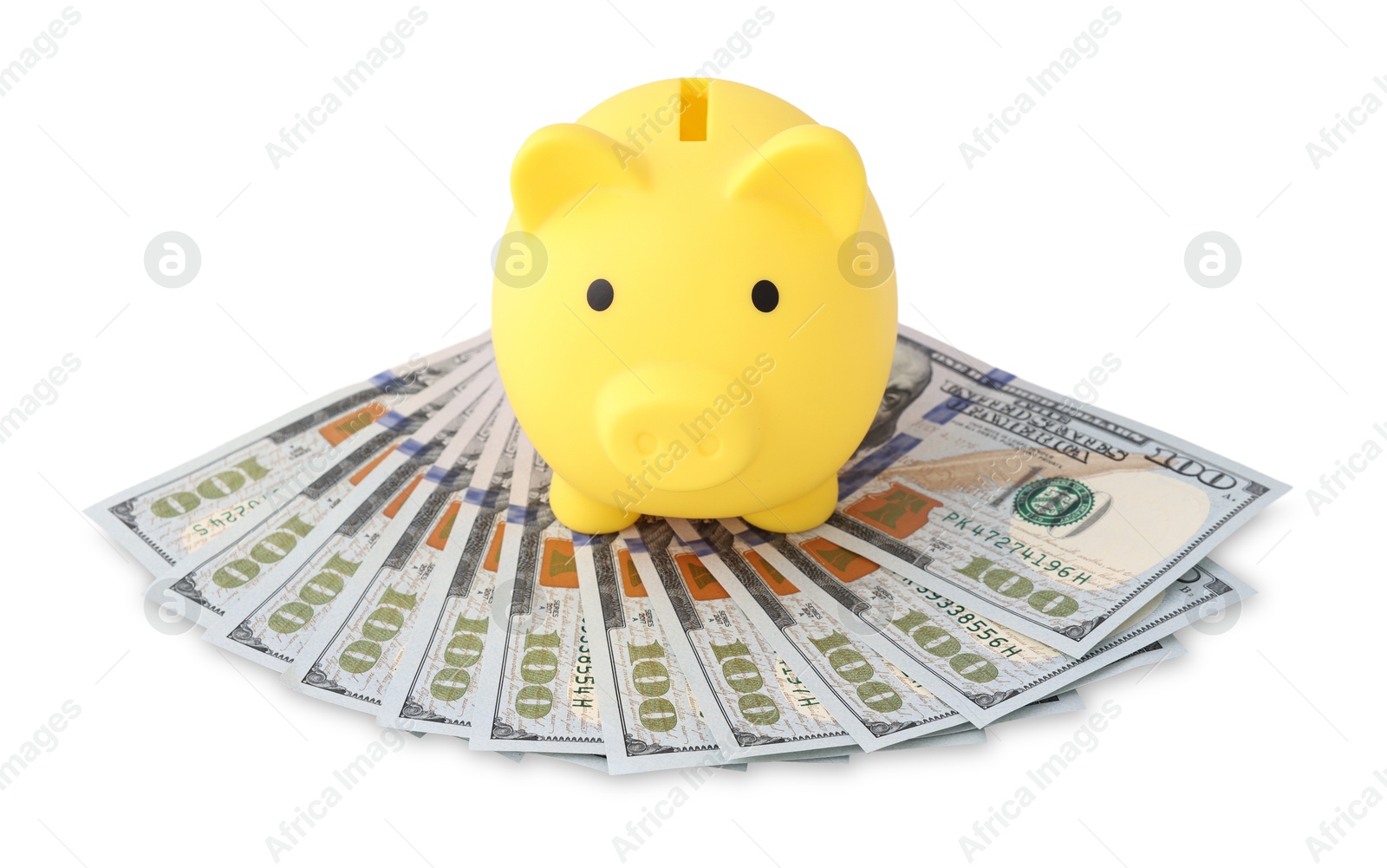 Photo of Yellow piggy bank and money on white background