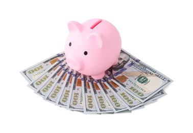 Pink piggy bank and money on white background, above view