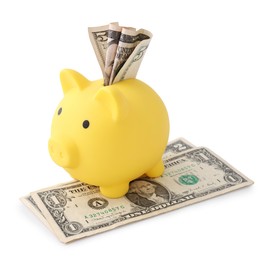 Photo of Yellow piggy bank and money on white background