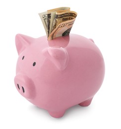 Photo of Pink piggy bank with money on white background