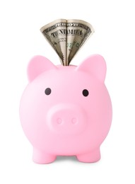 Photo of Pink piggy bank with money on white background