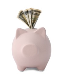 Piggy bank with money on white background