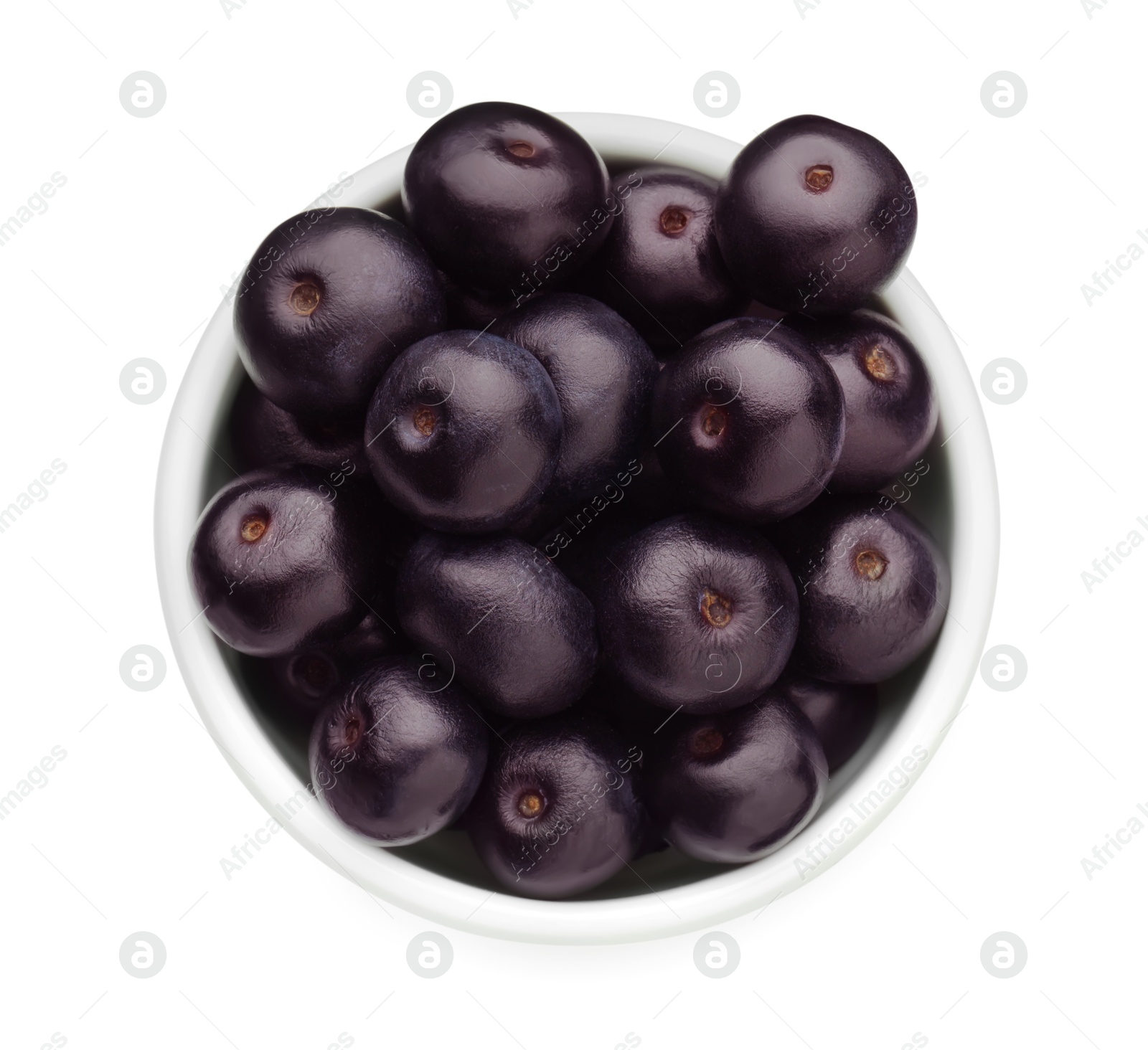 Photo of Fresh ripe acai berries in bowl isolated on white, top view