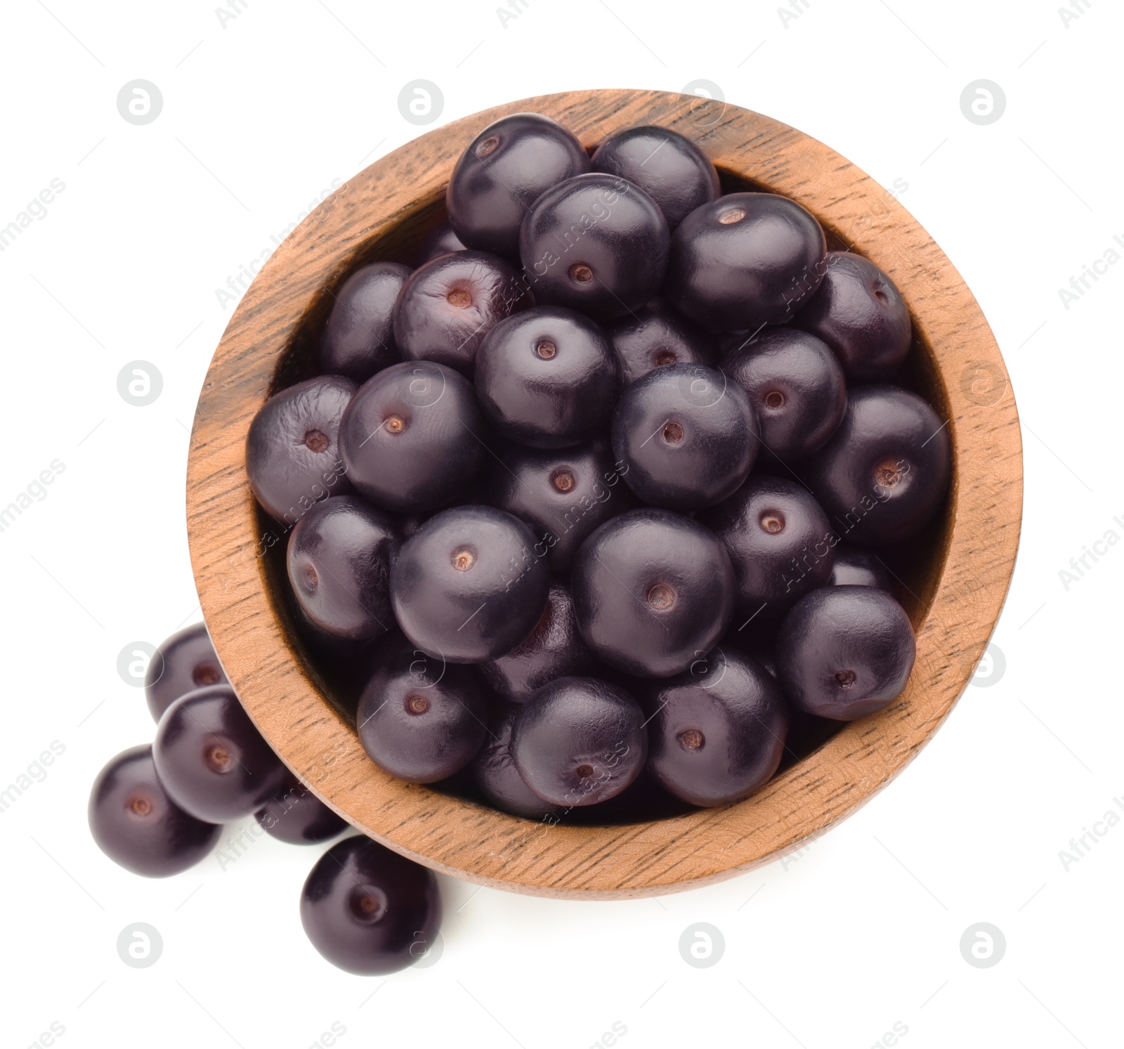 Photo of Fresh ripe acai berries in bowl isolated on white, top view