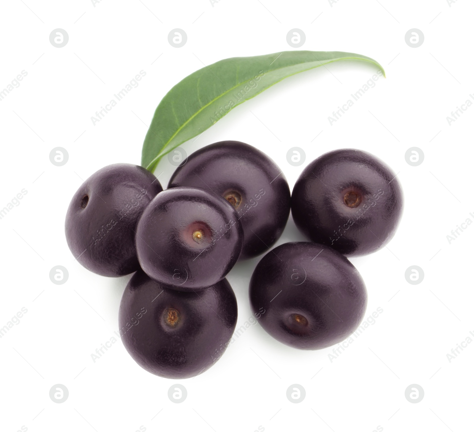 Photo of Fresh ripe acai berries and green leaf isolated on white, top view