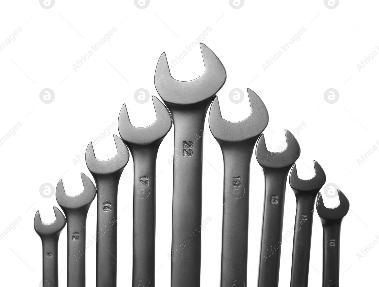 Photo of Set of ratcheting wrenches on white background. Auto mechanic tools