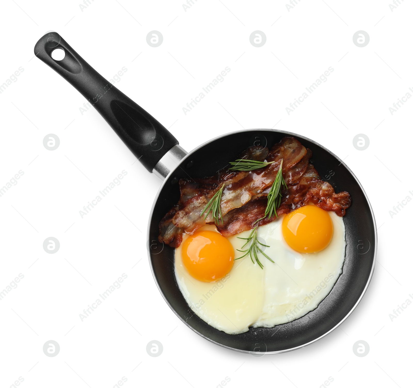 Photo of Tasty bacon, eggs and rosemary in frying pan isolated on white, top view