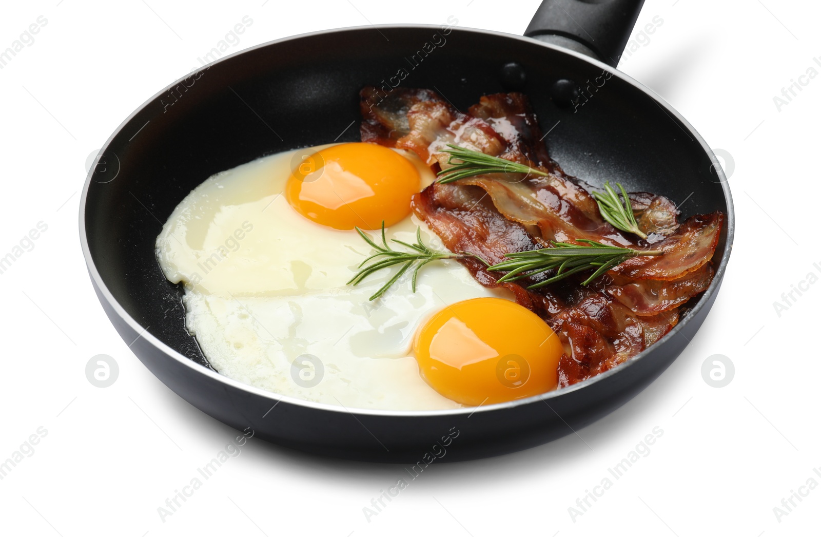 Photo of Tasty bacon, eggs and rosemary in frying pan isolated on white