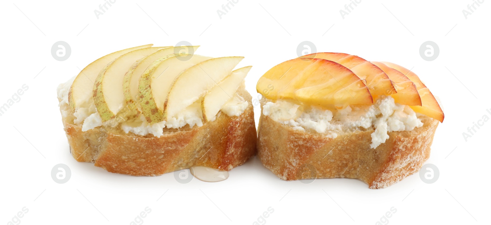 Photo of Delicious ricotta bruschettas with pears and apricots isolated on white