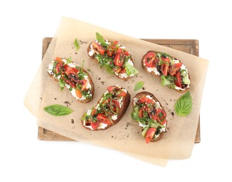 Photo of Delicious ricotta bruschettas with tomatoes, arugula and basil isolated on white, top view