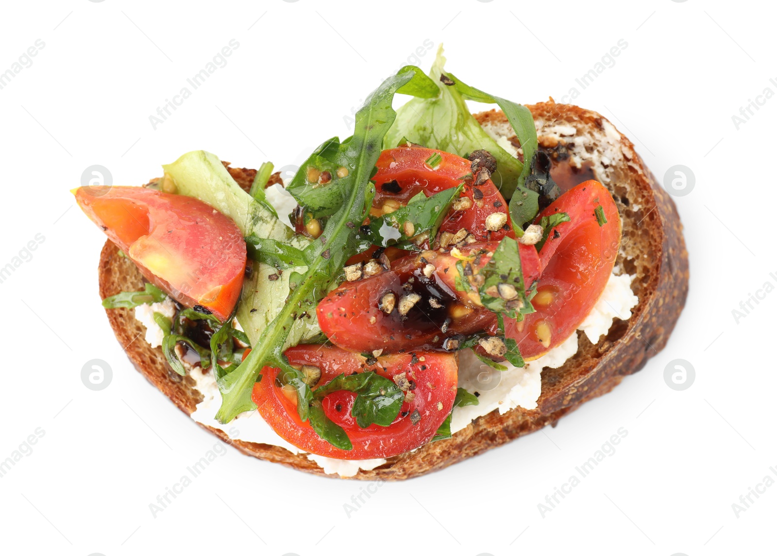 Photo of Delicious bruschetta with ricotta cheese, tomatoes and arugula isolated on white, top view