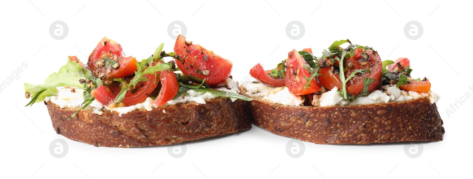 Photo of Delicious bruschettas with ricotta cheese, tomatoes and arugula isolated on white