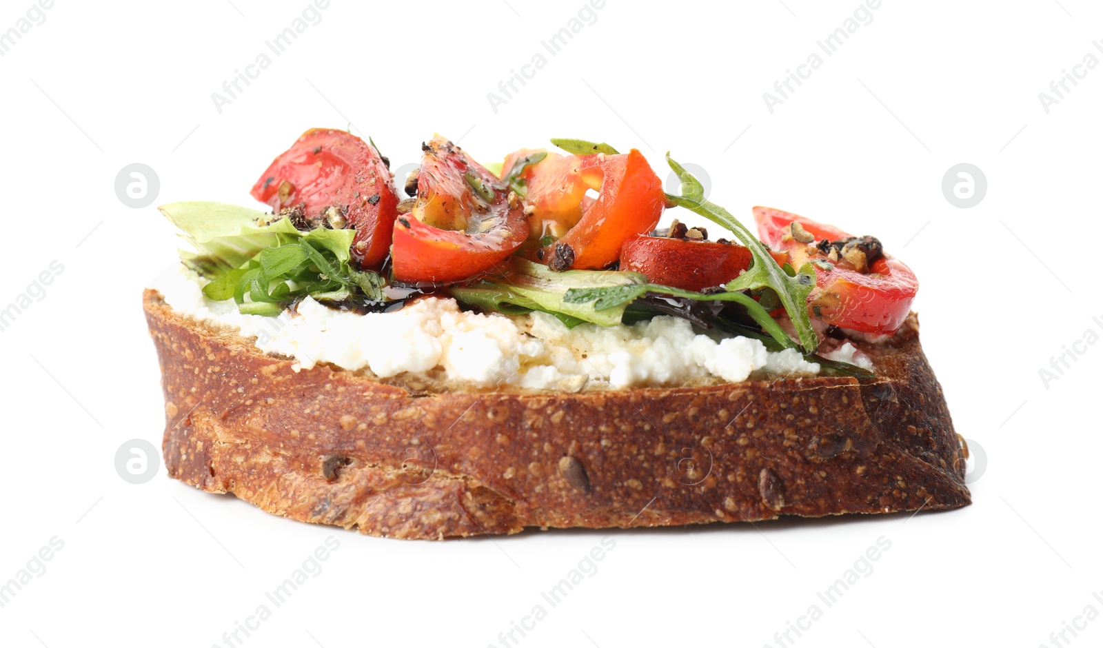 Photo of Delicious bruschetta with ricotta cheese, tomatoes and arugula isolated on white