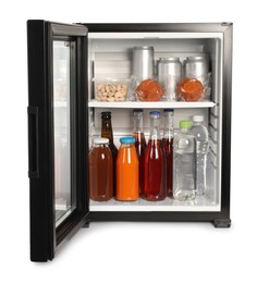 Mini refrigerator with drinks and snacks isolated on white