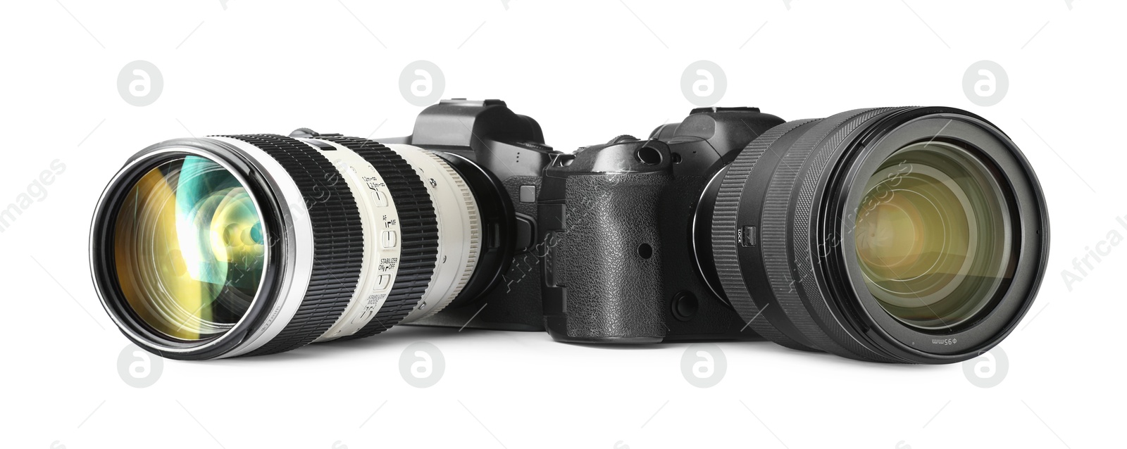 Photo of Modern cameras isolated on white. Photographer's equipment