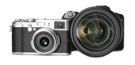 Modern cameras isolated on white. Photographer's equipment