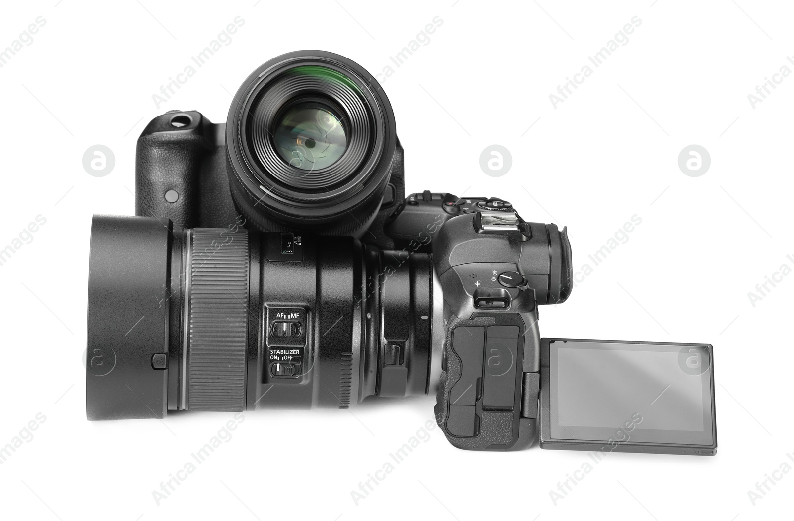 Photo of Modern cameras isolated on white. Photographer's equipment