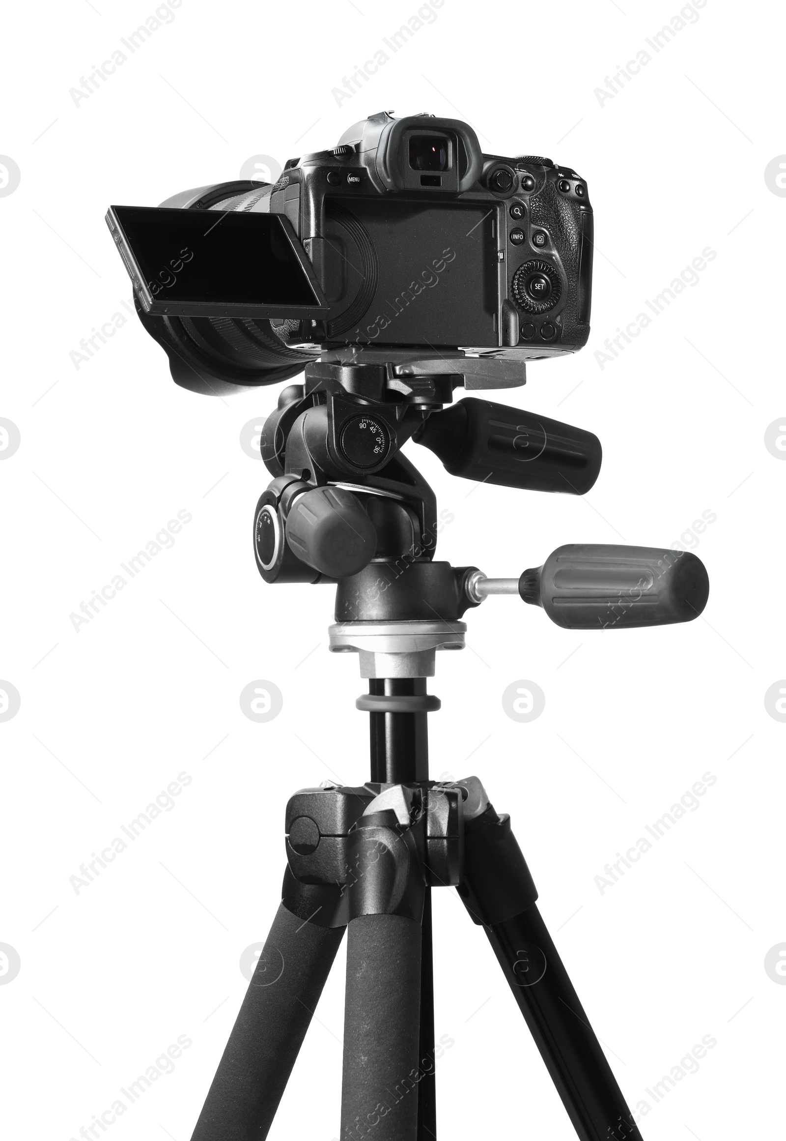 Photo of Modern camera with tripod isolated on white. Photographer's equipment