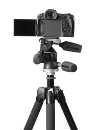 Modern camera with tripod isolated on white. Photographer's equipment