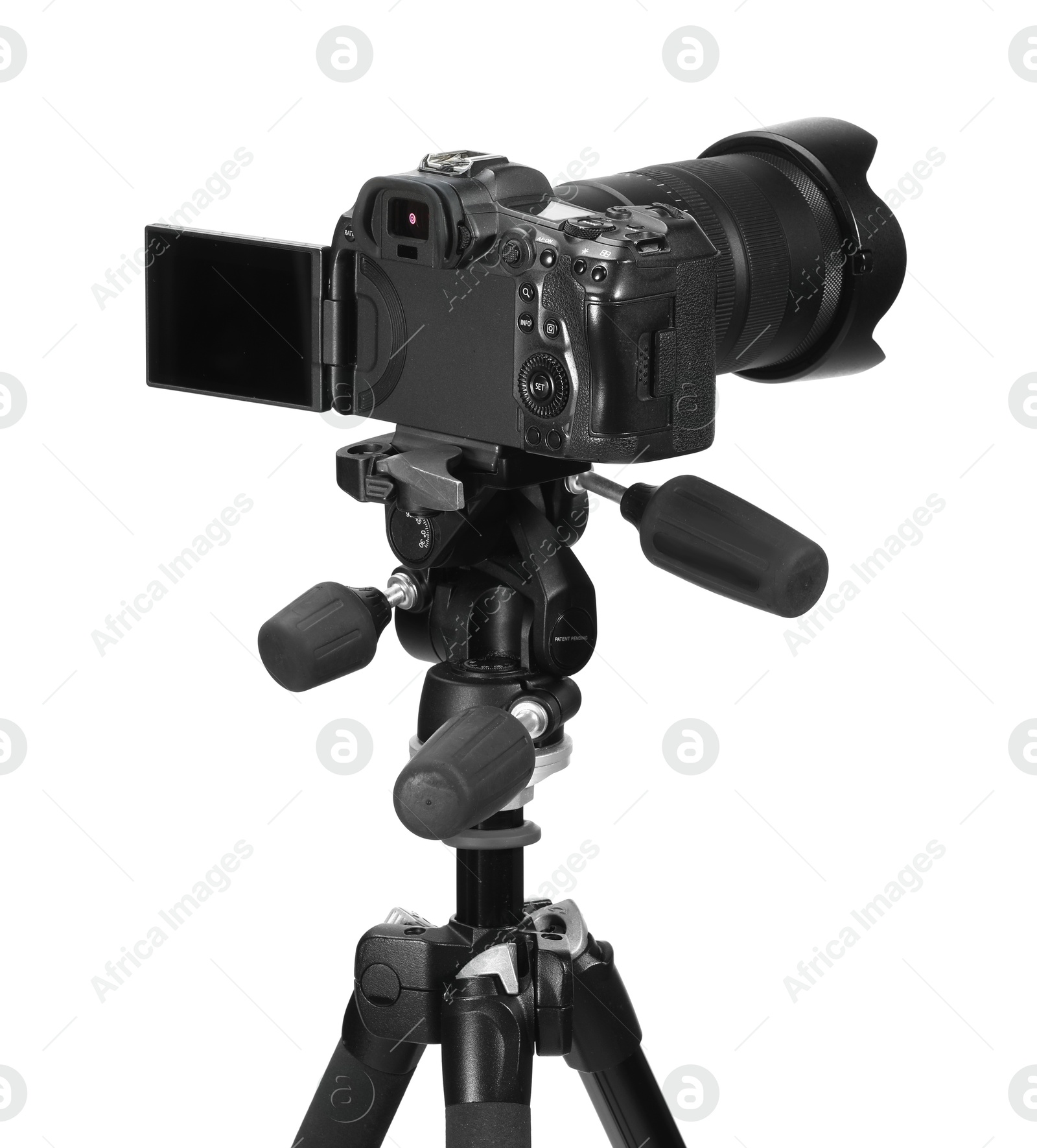 Photo of Modern camera with tripod isolated on white. Photographer's equipment