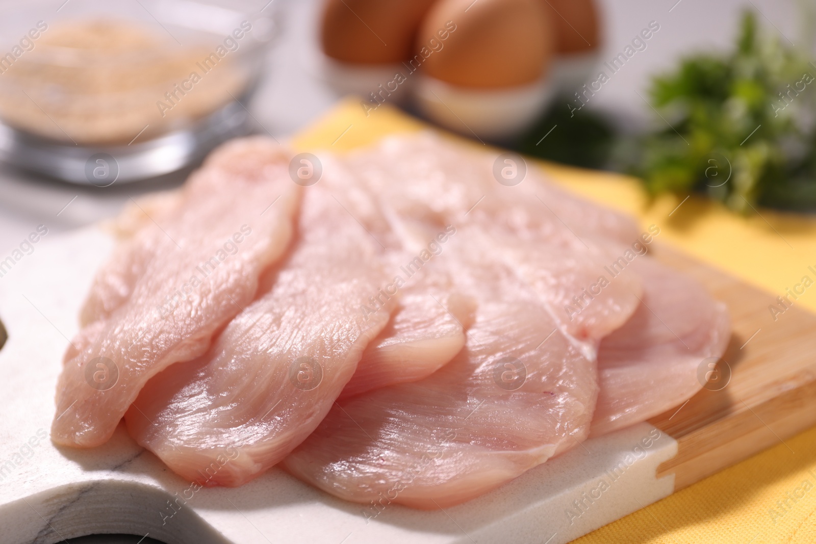 Photo of Cooking schnitzel. Raw meat on table, closeup