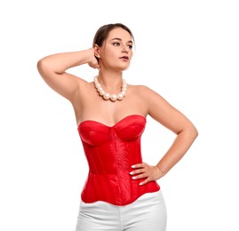 Beautiful woman in red corset posing on white background