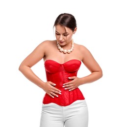 Beautiful woman in red corset posing on white background