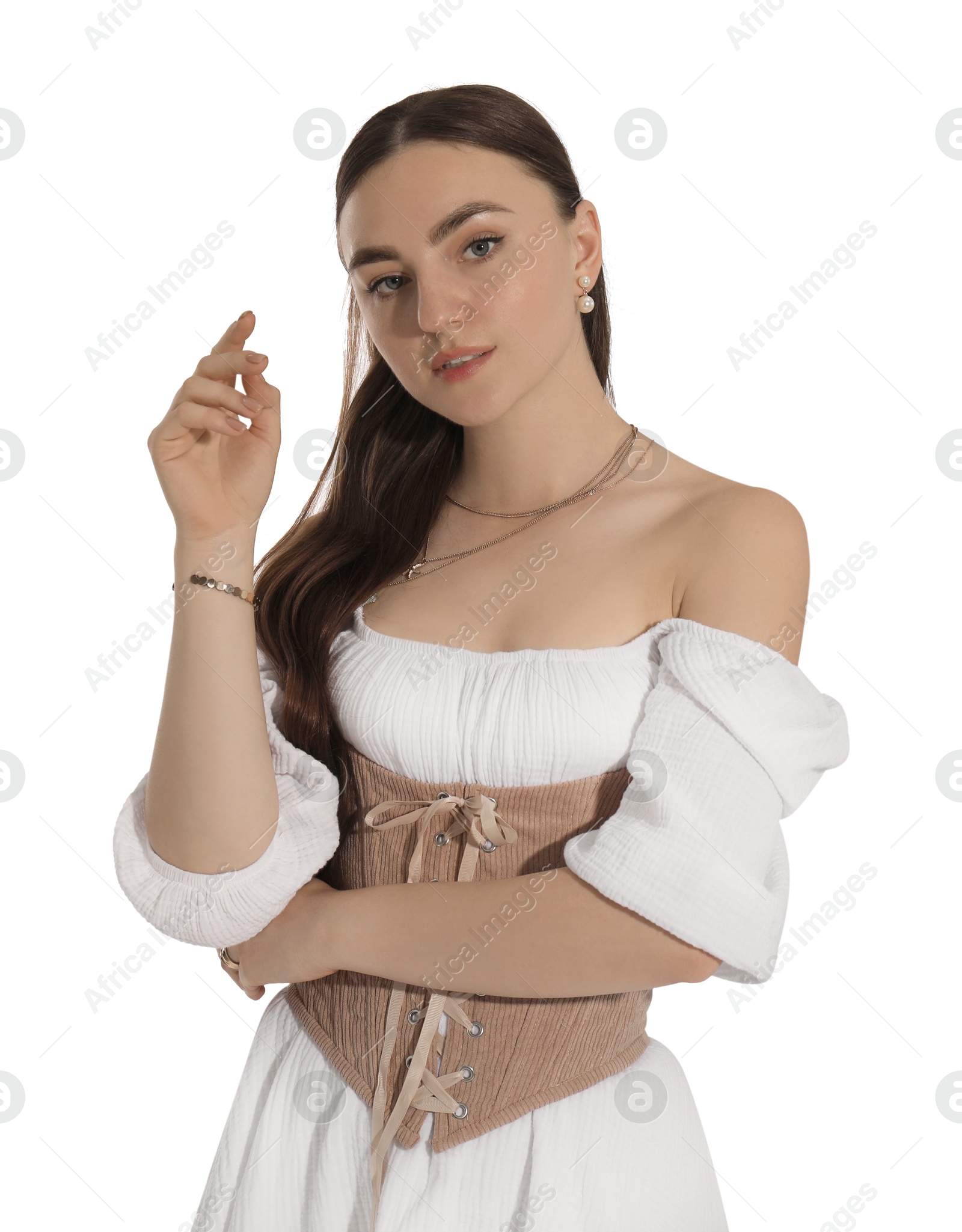 Photo of Beautiful woman in velvet corset posing on white background