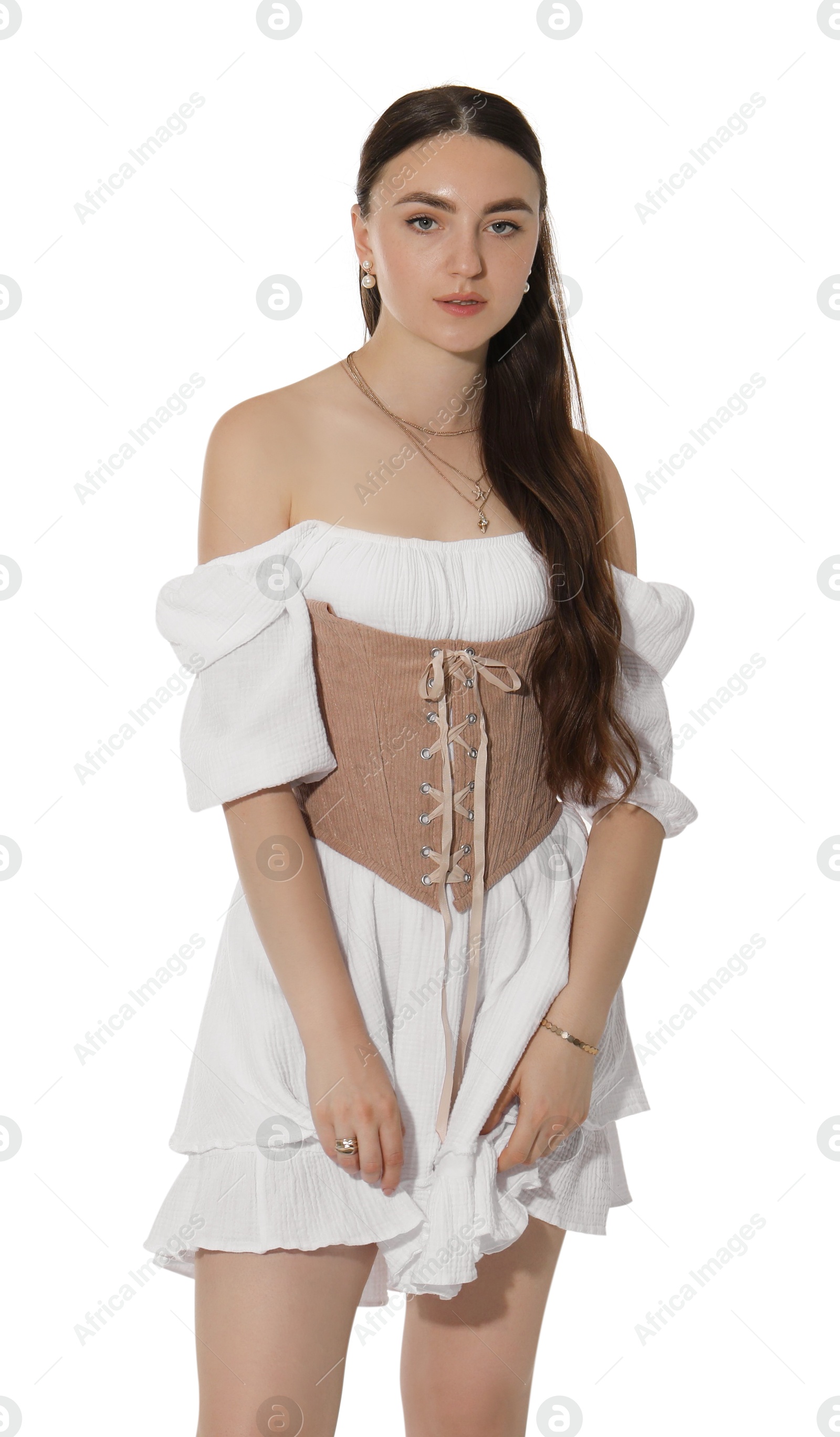 Photo of Beautiful woman in velvet corset posing on white background