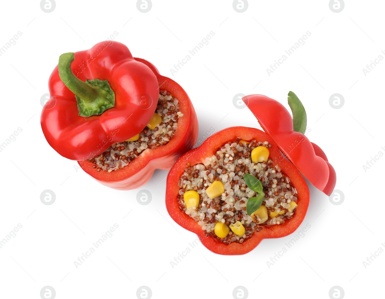 Photo of Quinoa stuffed bell peppers isolated on white, top view